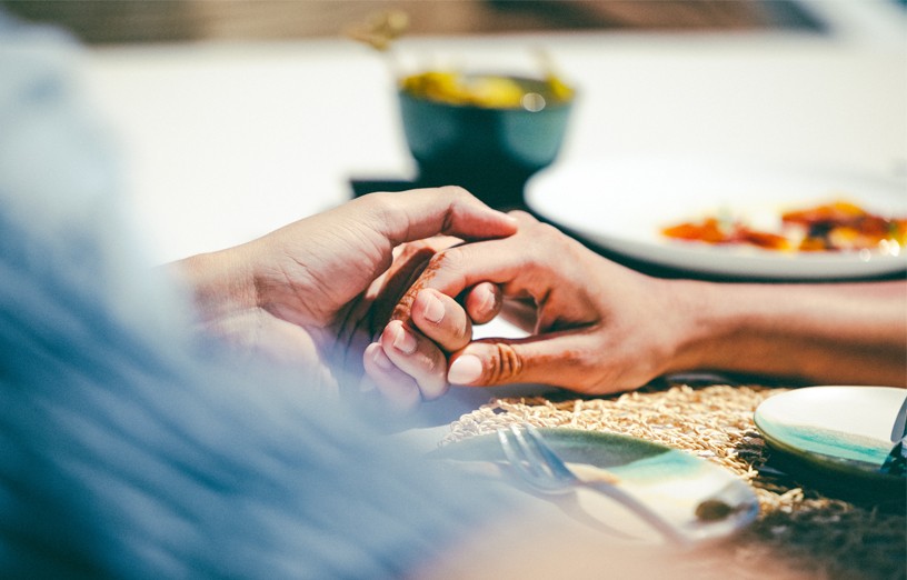 couple holding hands on luxury Superyacht charter